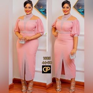 Slitter Dress with rhinestones work design.